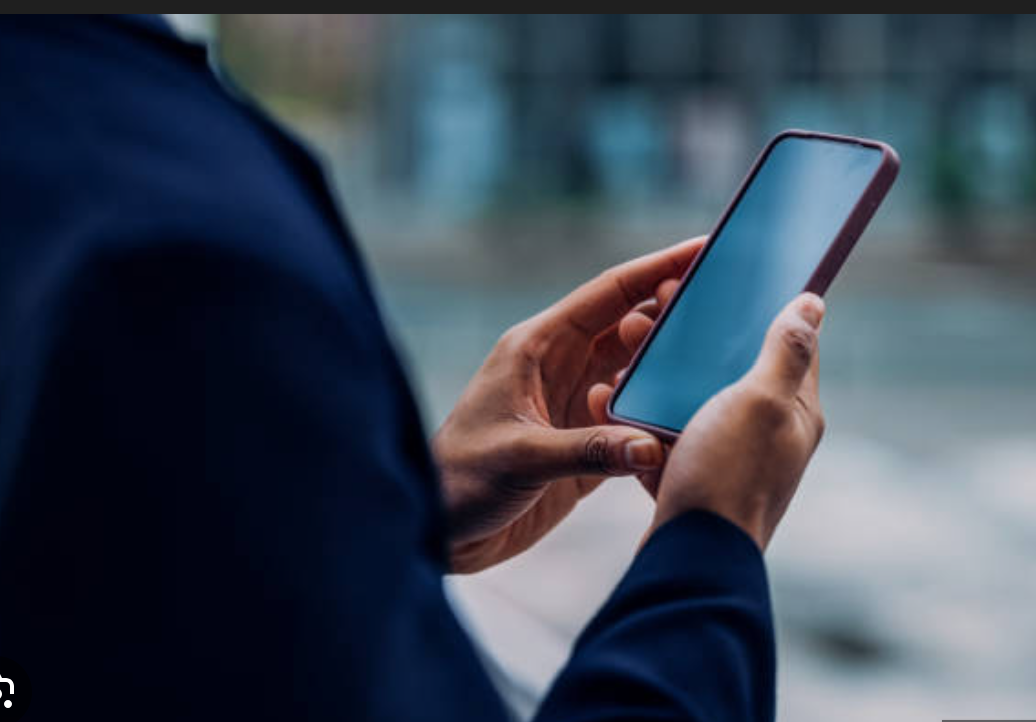 Person sending money on the phone